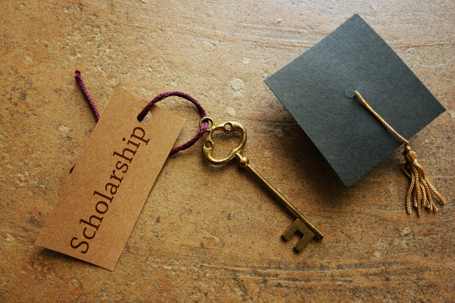a graduation cap with a scholarship key, eligibility criteria, essay prompt, personal information, college admissions process, high school student, financial need, scholarship essay question, academic achievement, best candidates, scholarship mistakes