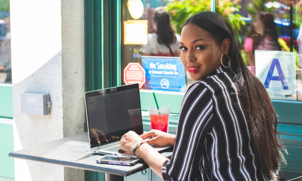 A College Freshman at a cafe applying for virtual summer externships, remote externships, summer internships