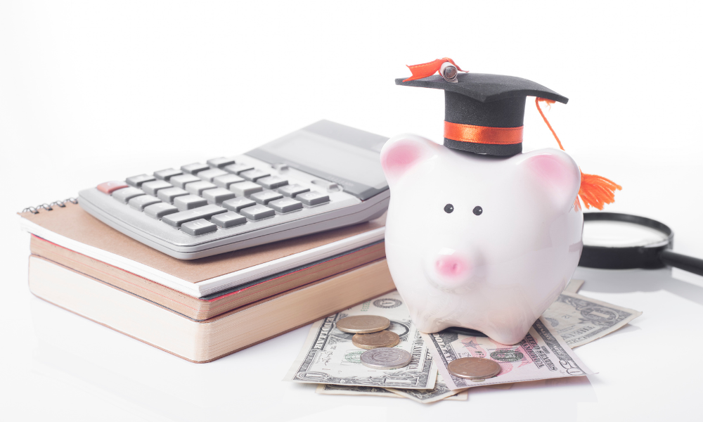 A piggy banl with coins and dollars bills under it and a calculator on top of books, scholarship application process, eligible students, financial aid office, HBCUs, TMCF, NAACP, grade point average, current student, college freshmen, college sophomores, college juniors, college seniors, graduate students