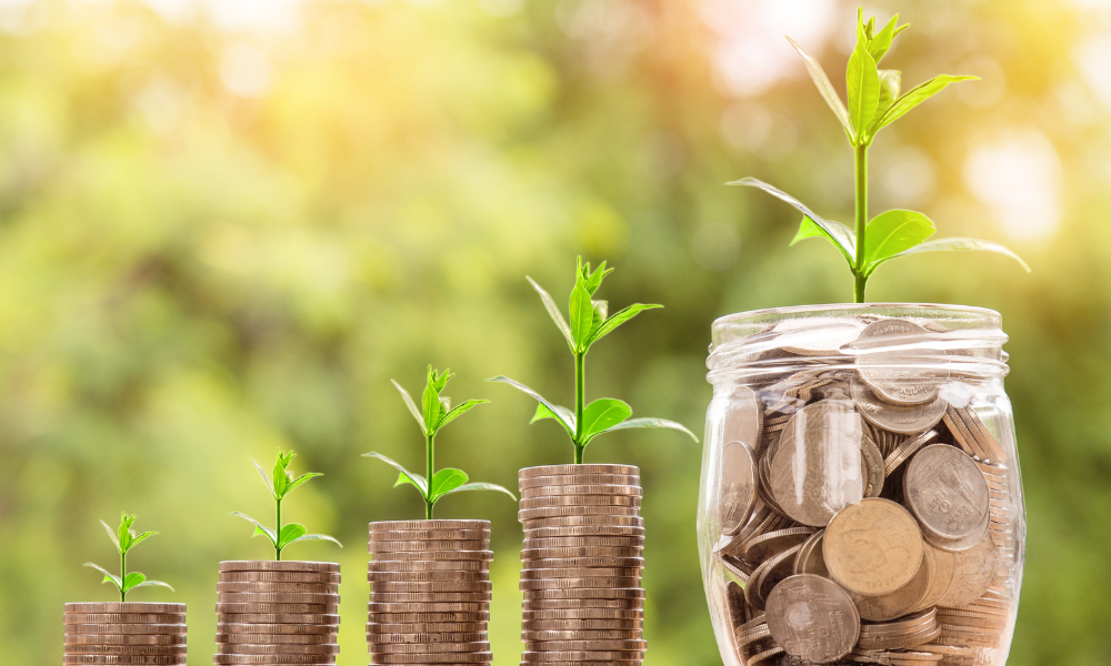 Stacked coins and coins in a mason jar, scholarship money, financial support. schoalrship process, credit hours, female student, may deadlines, scholarships due in May, full tuition