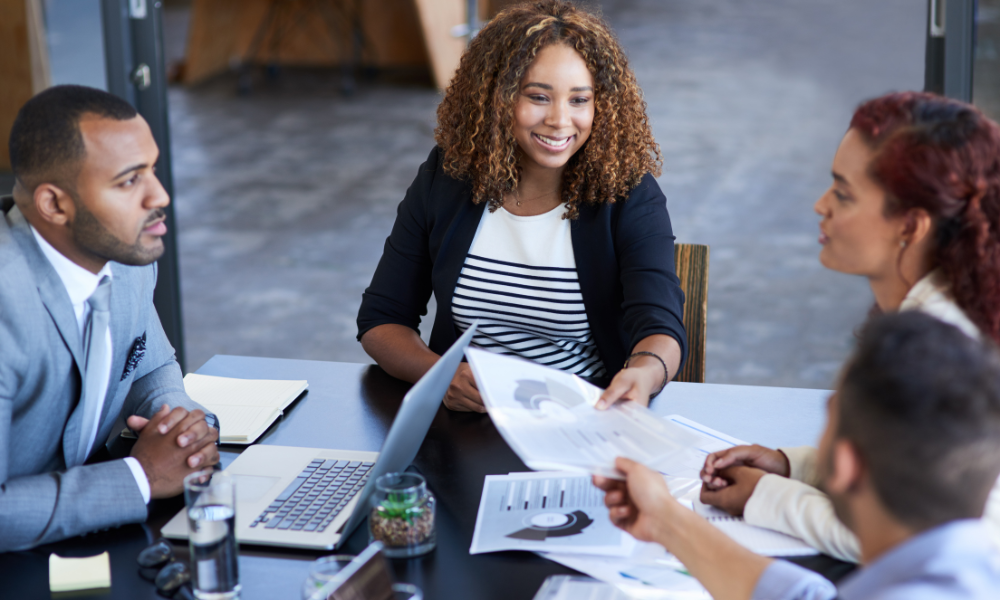 A college female at a business meeting for her summer internship, application opens, practical work experience, research opportunities, current students, summer semester, year of work experience, application hire, summer intern, internship deadline