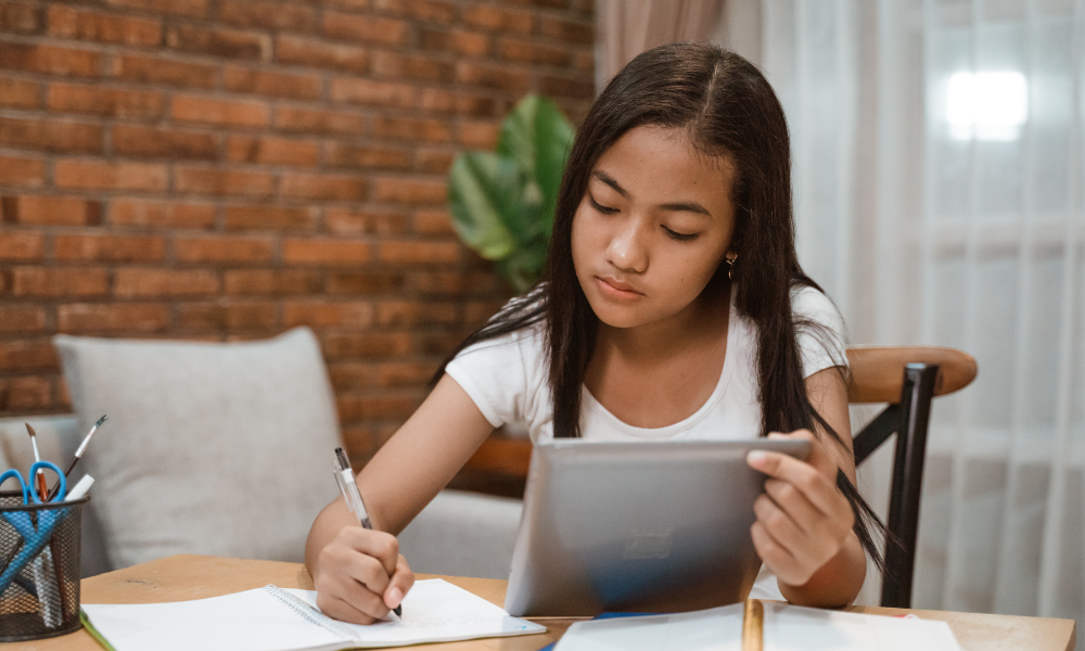 High school girl applying for June scholarships on her lap top, high school students, financial need, stem field, undergraduate studies, united states, u.s. citizens, university students, certificate program, graduating high school