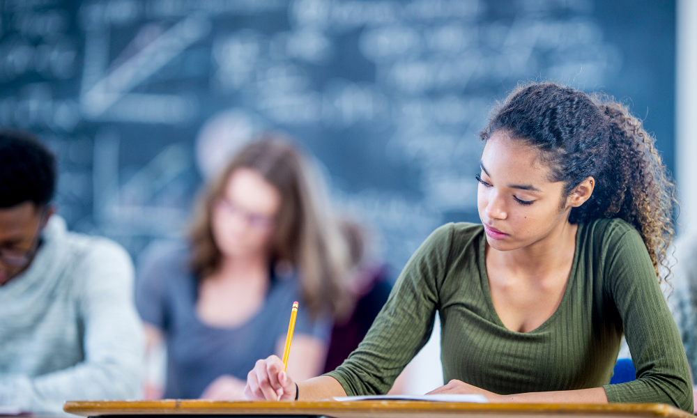 A high school student taking notes in class, june deadlines, private institutions, email address, international students, high schoolers, inspiring service project, scholarships for high school students