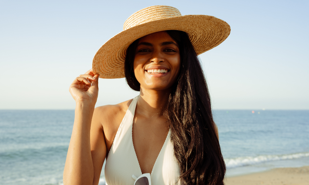 College student at the beach, summer scholarships, July scholarships, computer scicence, HBCU students, African American students, Black students, Hispanic students, Pacific Islander students, minority students, Thurgood Marshall Fund, UNCF scholarships, word essay. video essay, scholarship fund