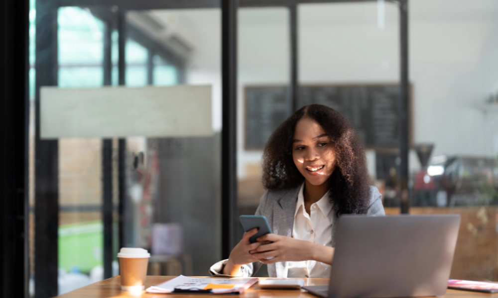 College student is searching for marketing scholarships while working at her business internship, minority scholarships, african american scholarships, hispanic scholarships, latino scholarships, Asian american scholarships, finance scholarships, business scholarships for college students, financial aid office, college scholarships, scholarships requirements