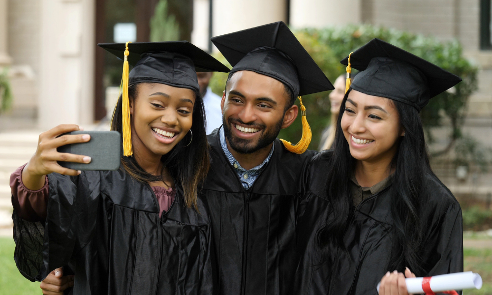Three HBCU students in their graduation robes and caps, minority scholarships, HBCU scholarships, african american scholarships, scholarship fund, financial need, financial support, eligible students, scholarship search, November scholarships, graduate students scholarships, grad school scholarships, November scholarships for graduate school, college fund, graduate level
