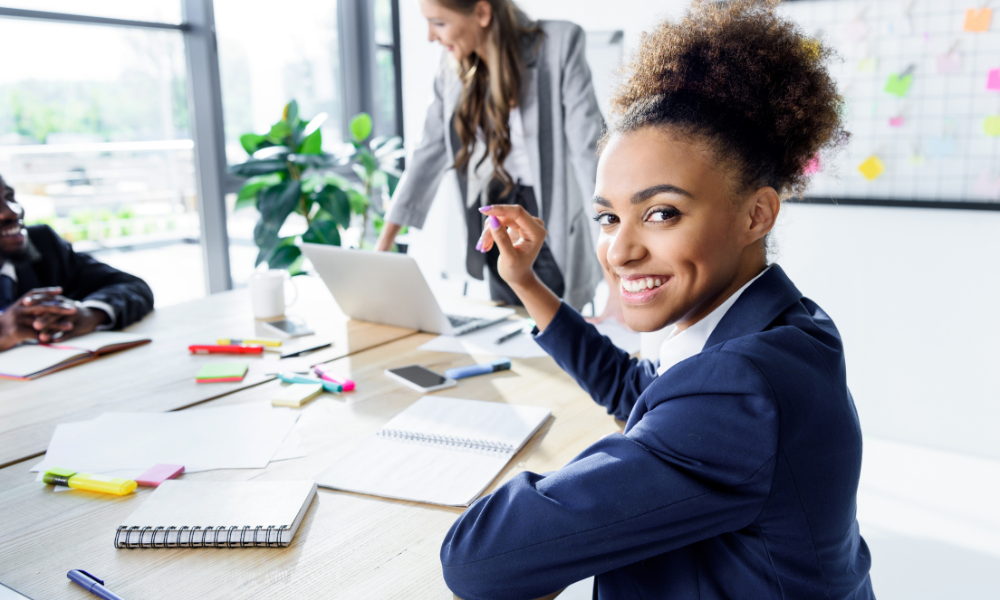 Business intern is in a meeting at work, business scholarships, business students, minority students, eligibility criteria, numerous scholarships, permanent residents, financial assistance, senior year, business degree, financial planning, marketing majors, application process, financial aid office, leadership roles