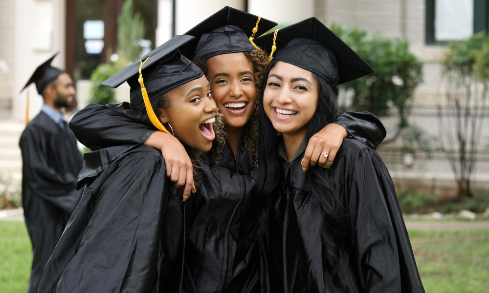 Three high school graduates in their cap and gowns, college bound, graduating high school seniors, financial need , great opportunities, graduate school, United States, black students, financial support, college scholarships, native american students, junior college, community service, community college, vocational school, trade school, eligible students, STEAM scholarships, marketing scholarships, MBA scholarships, finance scholarships, business scholarships, accounting scholarships, data science scholarships, computer science scholarships, engineering scholarships, business majors, communication majors, journalism majors, law school, pre-law major, medical school, November scholarship opportunities