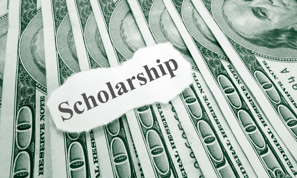 A pile of scholarship money, February scholarships, scholarships for Black students, scholarships for high school seniors, freshmen scholarships, sophomore scholarships, junior scholarships, senior scholarships, college scholarships, undergraduate scholarships, scholarships for African Americans, February scholarships for Black students