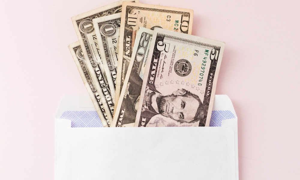 A college bound high school senior has an envelope filled with scholarships funds. The high school senior is also looking for scholarships for students that have been accepted into an HBCU and scholarships with March deadlines.