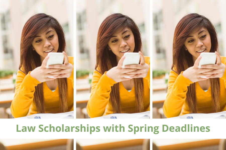 A female college students is using her cell phone to find cost of attendance for her dream law school and she is looking for law scholarships with spring deadlines for first-year law students.