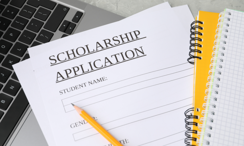 A college sophomore if applying to June scholarships and saving her money from her summer college intern program to help slash her college debt