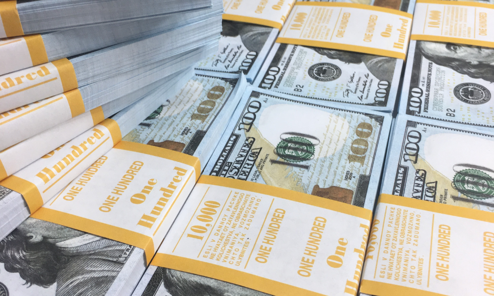A graduate student is at the bank withdrawing her scholarship money to pay for her first year of law school. She has started searching for scholarship opportunities for law school and she just complete a list of June scholarships for minority students and for incoming law students