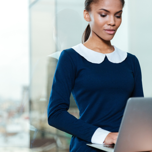 College student dressed in business attire at her business fellowship, pre-internship, summit, conference, internships, college intern, co-op, minority students, Black students, Hispanic students, Latinx students, African American students