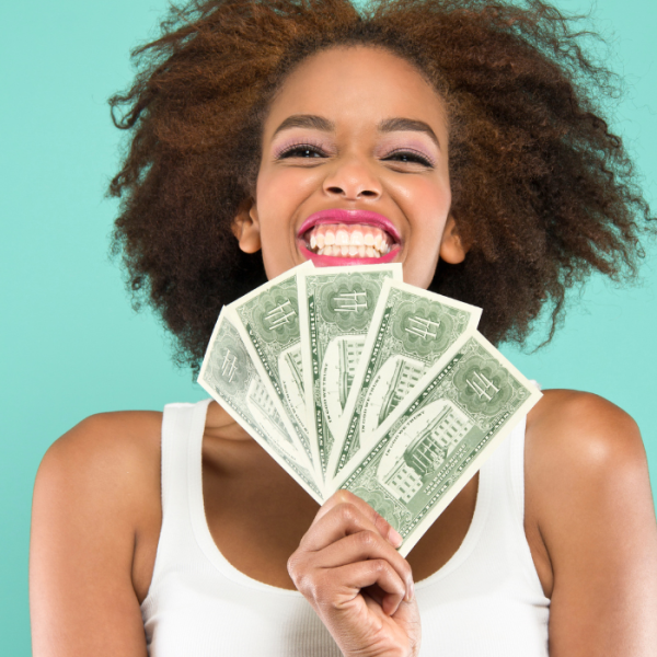 High school student is holding a wad of dollar bills that she won from applying to scholarships due in early May, high school seniors, financial need, graduate student, current college students, undergraduate students, high school seniors, incoming freshmen, college bound high school seniors