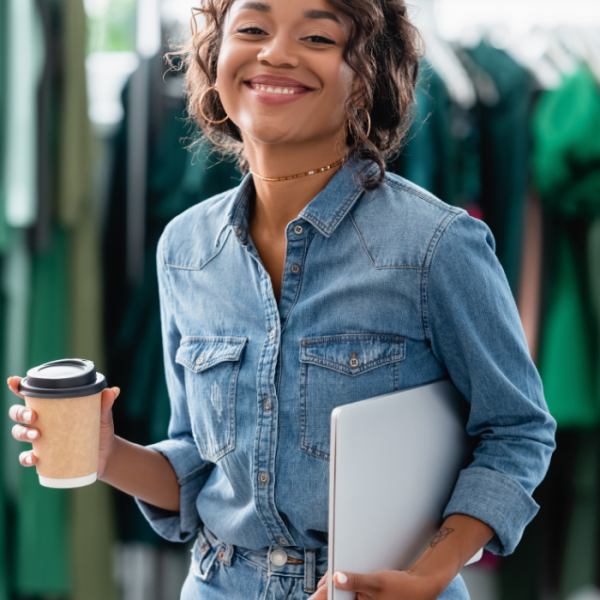 A college student casually dressed at one of her her summer externships, summer internship, immersion programs, career development, career opportunities, pre-internships