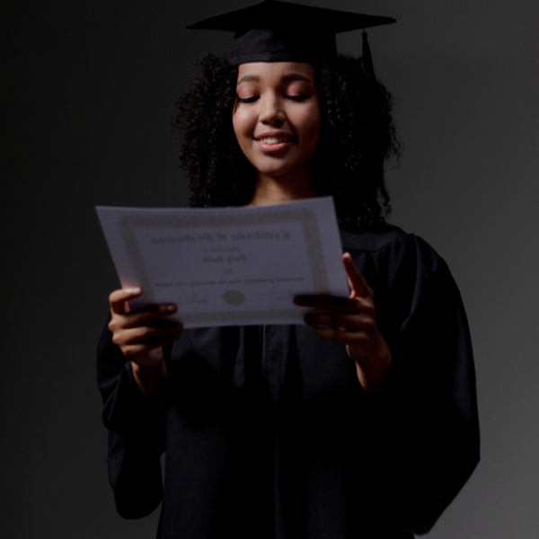 A high school senior in her cap and gown, law firm scholarship, scholarships with October deadlines, scholarship funds, financial need, aba-accredited law school, legal profession, bar exam, scholarship opportunities, career goals, college degree