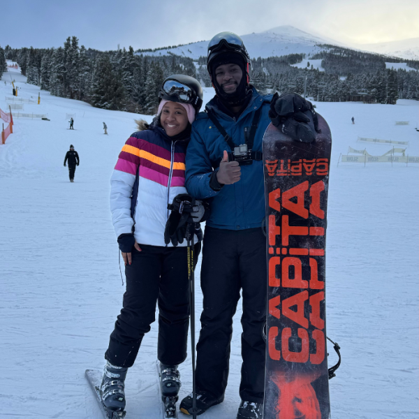 Two college students skiing over the Christmas break, winter scholarships, January scholarships, scholarships for high school seniors, scholarships for college bound seniors, scholarships for incoming freshmen