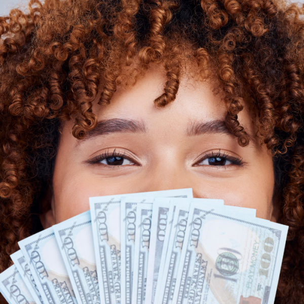 Female high school senior is showing the scholarship money she won. She is planning on applying for June scholarships for minority students and scholarships for incoming HBCU freshmen