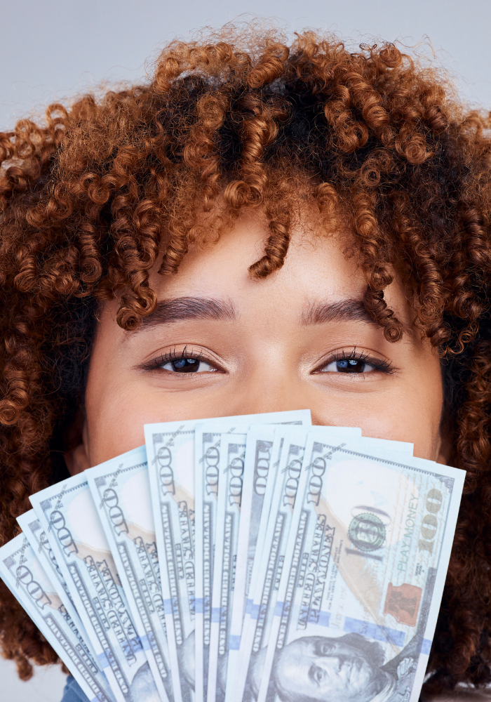 Female high school senior is showing the scholarship money she won. She is planning on applying for June scholarships for minority students and scholarships for incoming HBCU freshmen