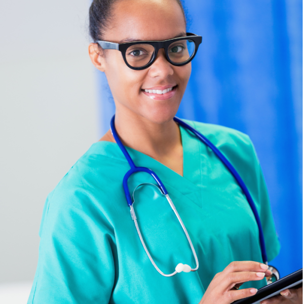 An HBCU student is dressed in scrubs for her nursing program is is searching for Nursing scholarships with summer deadlines